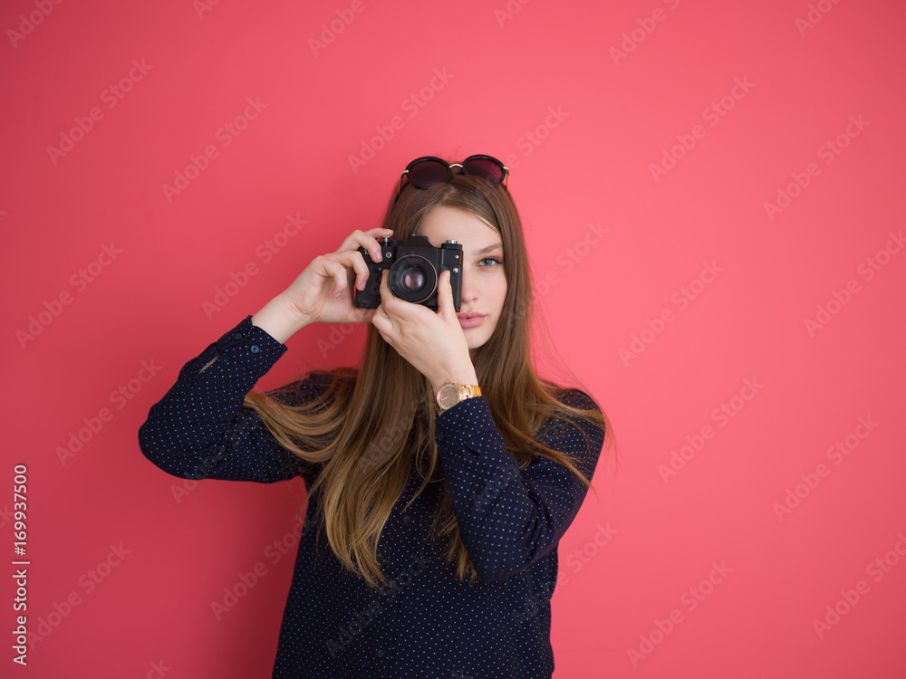 girl taking photo on a retro camera