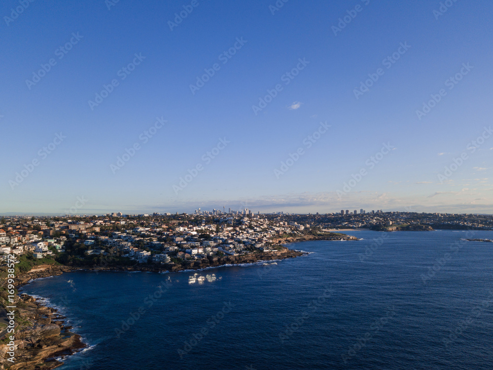 A view across Sydney easetern coastline with clear sky.