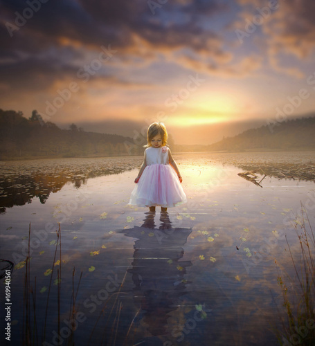 Little girl and adult reflection