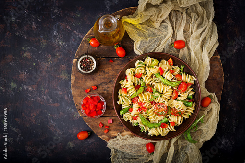 Salad - fusilli pasta with tomatoes, asparagus and sweet pepper