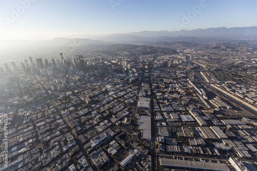 Aerial view above Alameda Street  Skid Row and the Arts District in downtown Los Angeles  California.