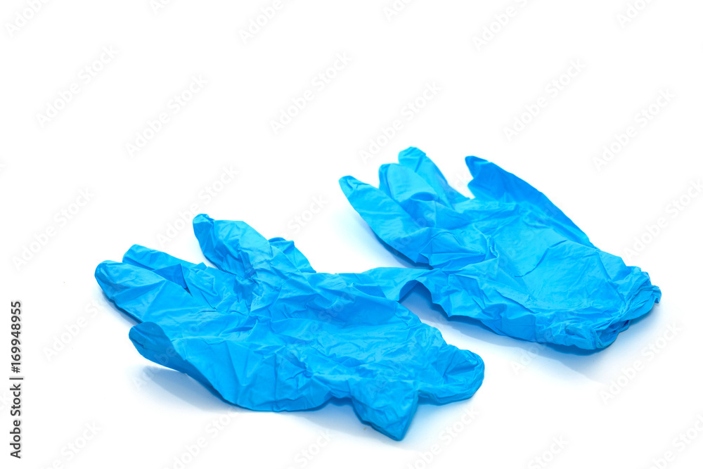 Fototapeta premium blue thin medical glove isolated on white background