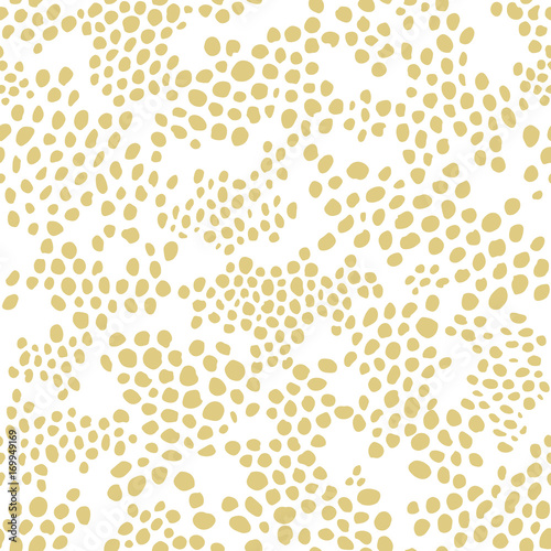 Abstract organic background with spots in gold. Seamless vector pattern