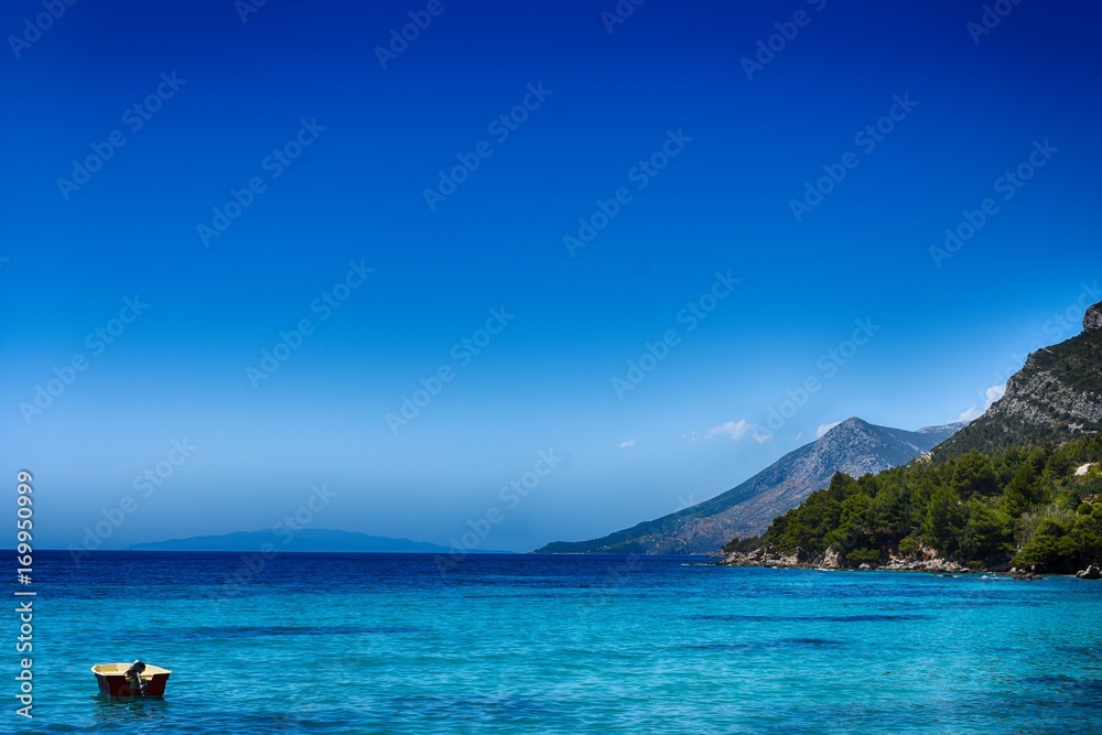 blue adriatic sea mountain on background 