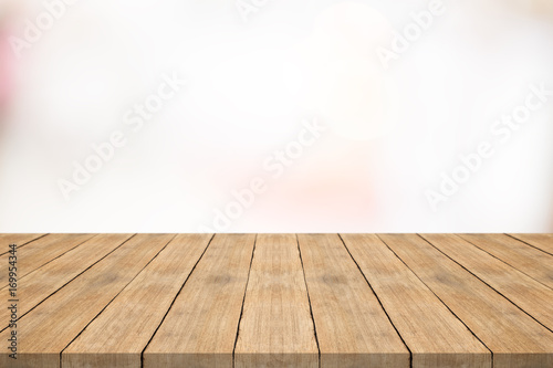 Empty wood table top on white blurred background,for montage your products © sorrapongs