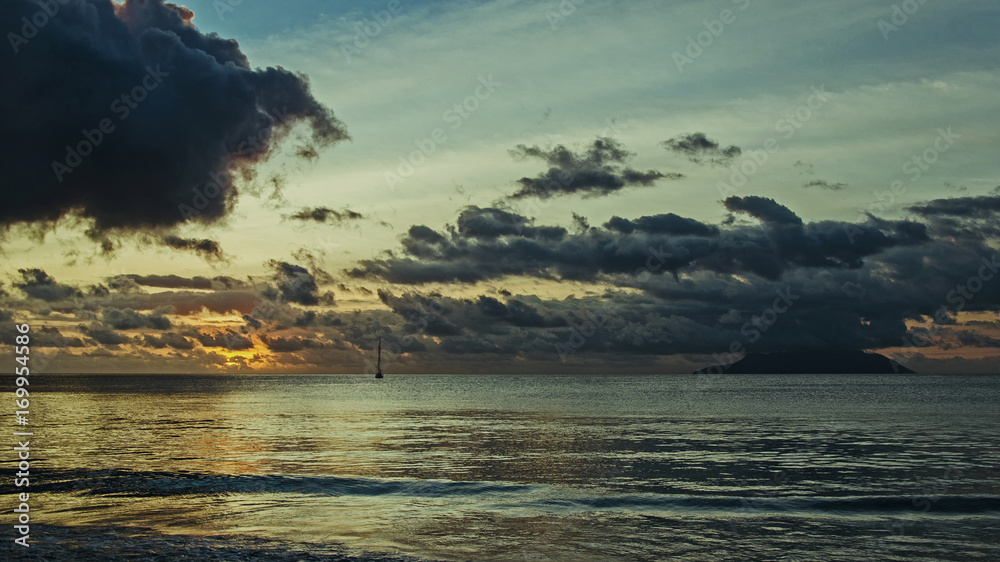 A picturesque colourful sunset on the Seychelles