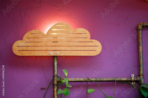 Original interior with wooden cloud and sun lamp