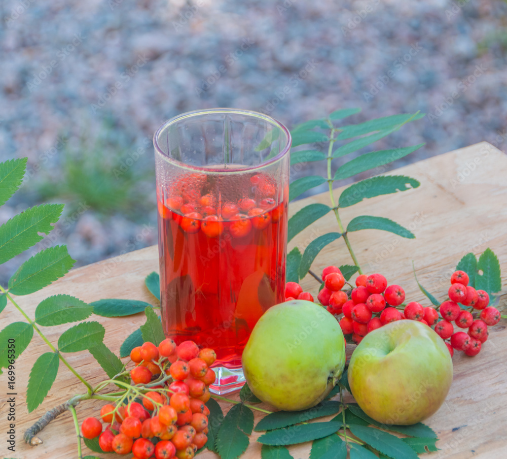 autumn drink, berry mountain ash and apples. autumn drink, berry mountain ash and apples.