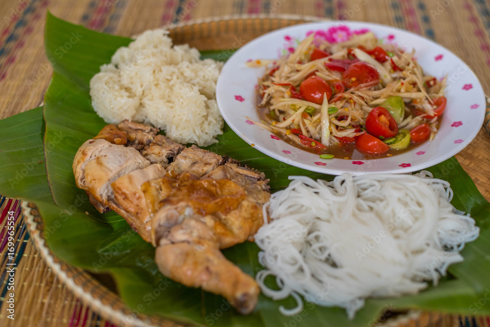 papaya salad and grilled chicken thai food papaya salad and grilled chicken thai food