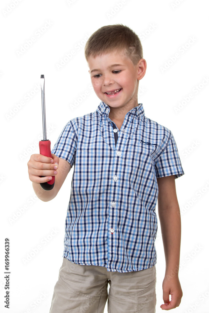 cute happy boy in blue checkered shirt, holding screwdriver, isolated on white background cute happy boy in blue checkered shirt, holding screwdriver, isolated on white background