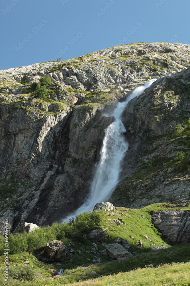 Beautiful high powerful mountain waterfall Beautiful high powerful mountain waterfall