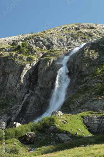 Beautiful high powerful mountain waterfall