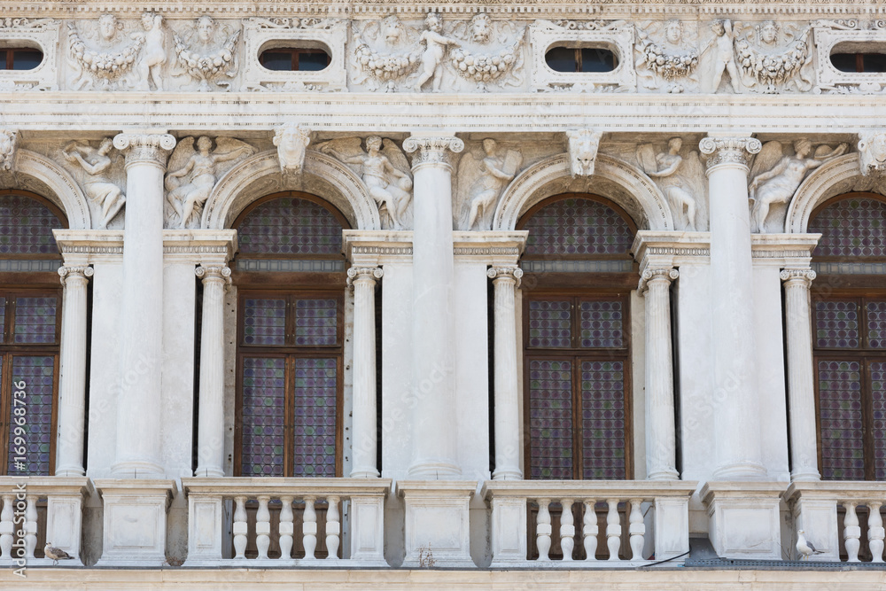 Beautiful facade of the Sansoviniana Library in Venice, Italy