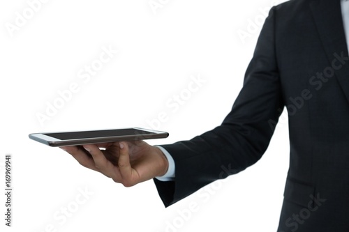 Cropped image of businessman holding digital tablet