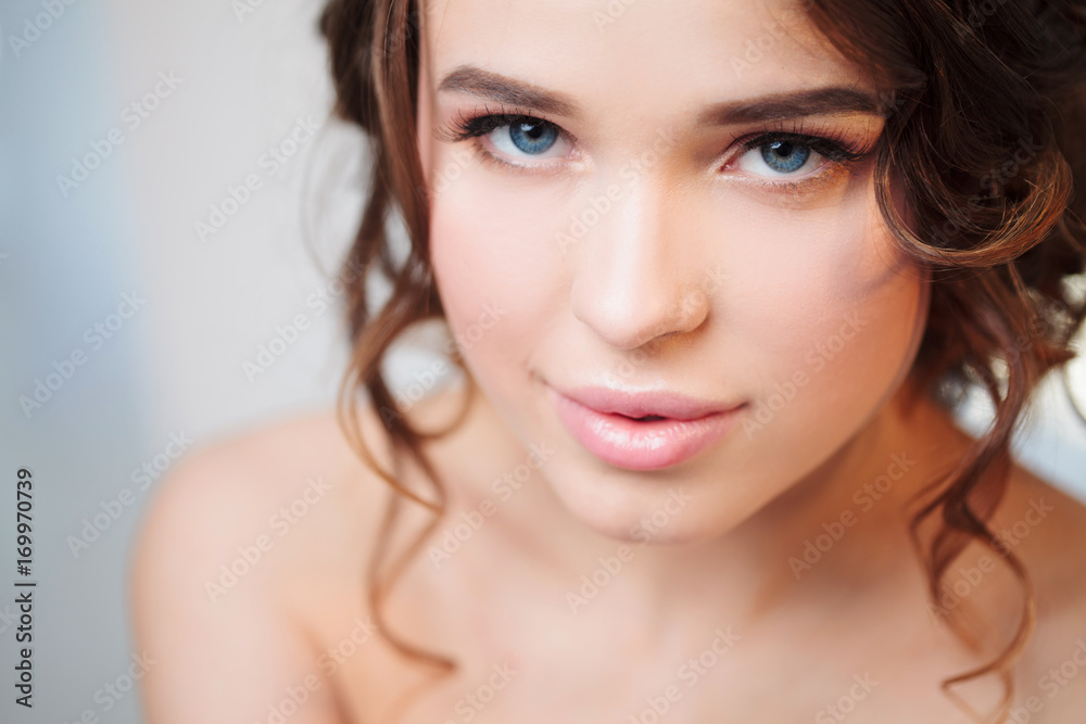 Attractive girl with beautiful eyelashes. Close-up Attractive girl with beautiful eyelashes. Close-up