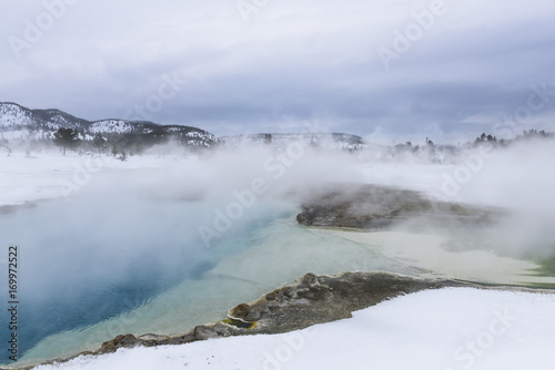 Steam Rising from Hot Spring in Winter