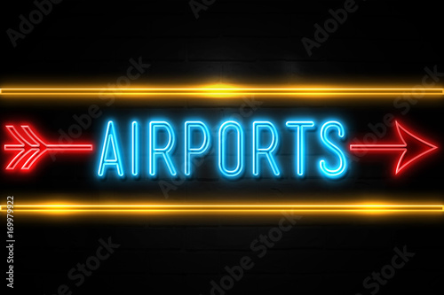 Airports  - fluorescent Neon Sign on brickwall Front view