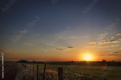 Sunset Over Rural Countryside in Brazil. Farm Concept Image.