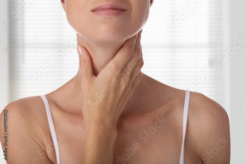 Woman thyroid gland control photo