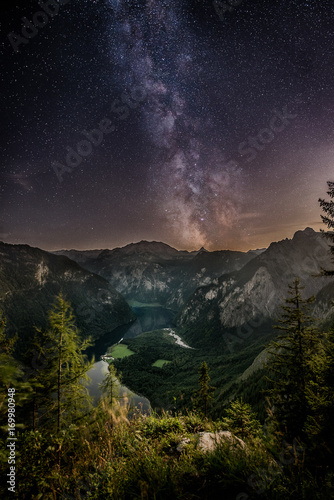 Beautiful mountain lake with milky way in Bavaria, Germany