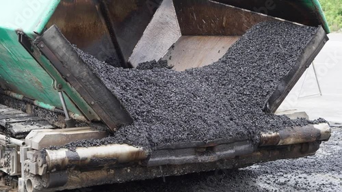 Asphalting works surfacing road machine