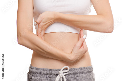 Female hands belly circling stomach