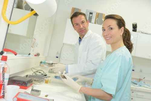 male and female researchers working at laboratory with analysis