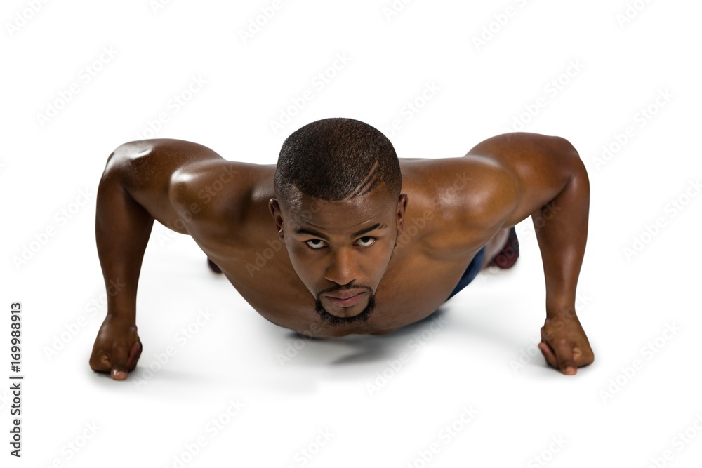 Portrait of sportsman practicing push ups
