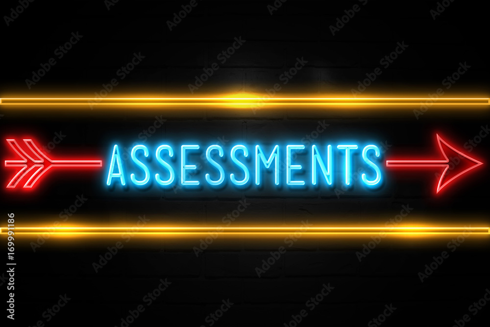 Assessments  - fluorescent Neon Sign on brickwall Front view