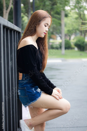 Portrait of thai adult beautiful girl relax and smile © tiniroma