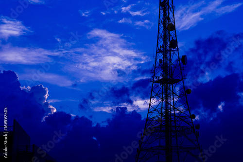 Broadcast pole and Telephone transceiver with blue sky.Public loudspeakers broadcast 