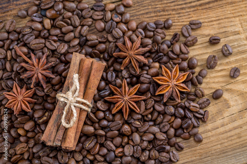 Background texture of grains of coffee cinnamon and anise stars