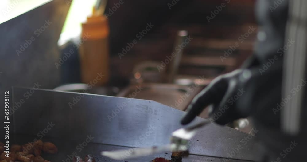 Food Truck owner frying an egg Food Truck owner frying an egg