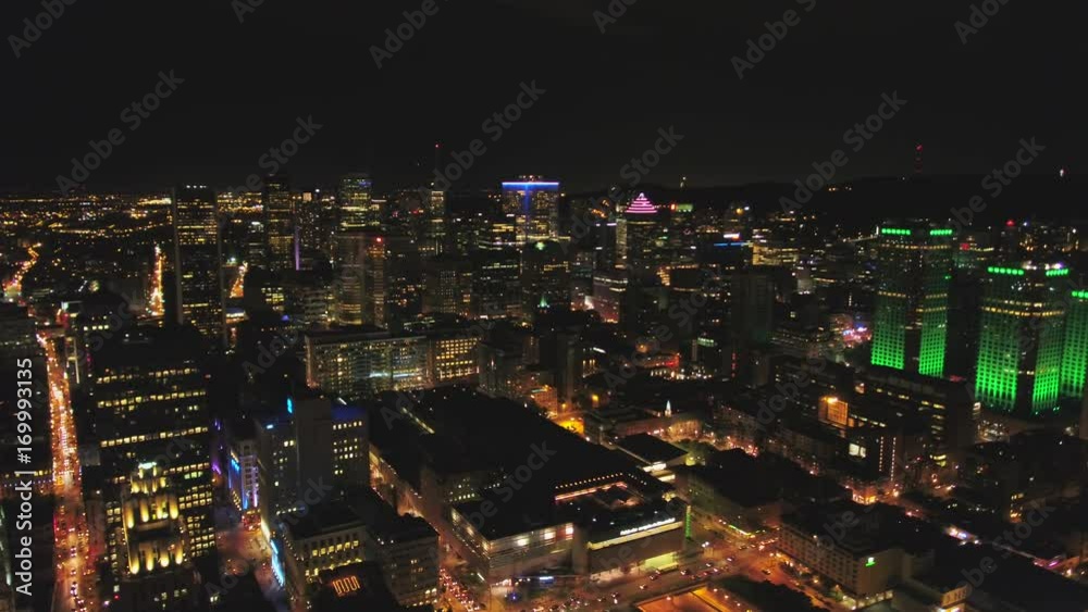 Montreal Quebec Aerial v41 Flying over downtown waterfront area panning with cityscape views at night Montreal Quebec Aerial v41 Flying over downtown waterfront area panning with cityscape views at night