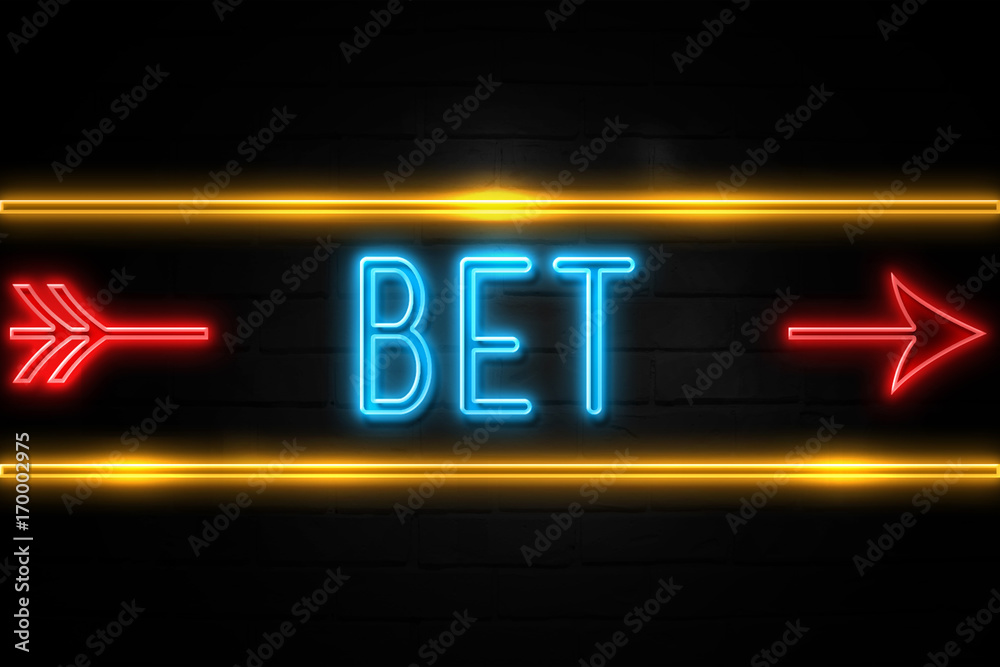 Obraz premium Bet - fluorescent Neon Sign on brickwall Front view
