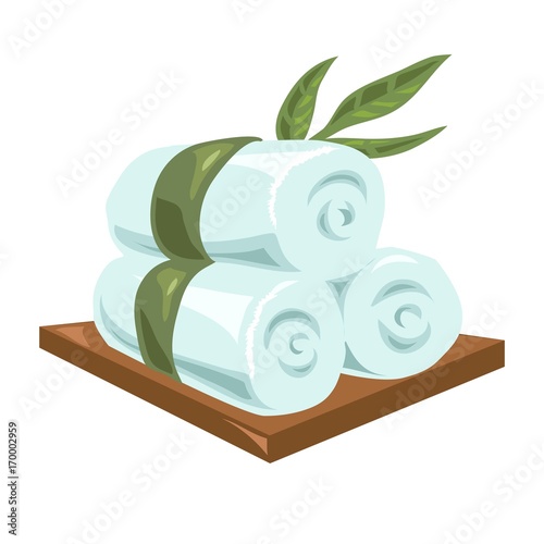 Hot rolled fresh towels tied with long green leaves