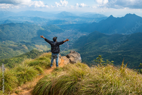 One man standing on the edge of Phu Chi Fa an iconic natural attraction in Chiang Rai the northern province of Thailand.