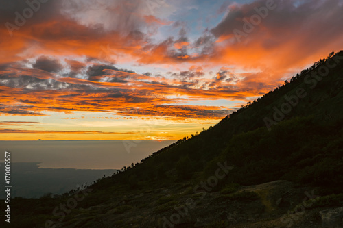Hills with beautiful orange sky with cloud