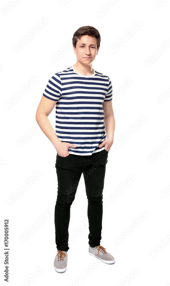 Cute teenager boy posing on white background