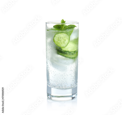 Delicious refreshing water with mint and cucumber in glass on white background