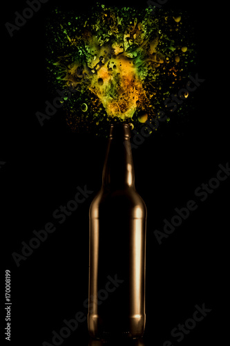 a bottle of beer  with spray