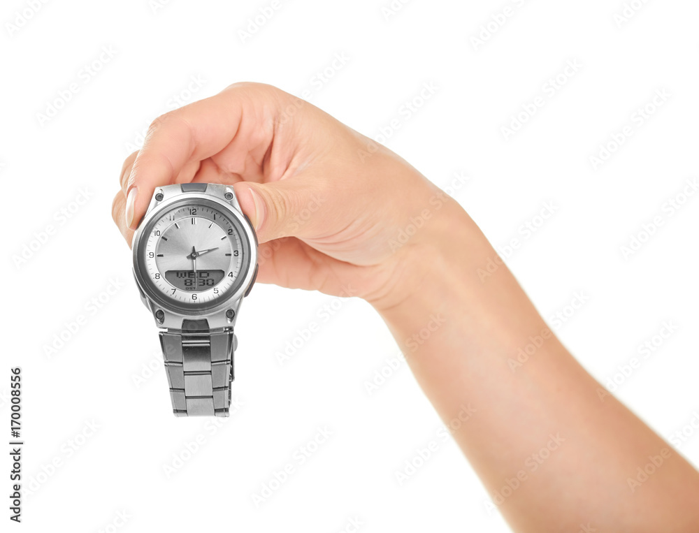 female hand holding hand watches. Isolated on white background female hand holding hand watches. Isolated on white background