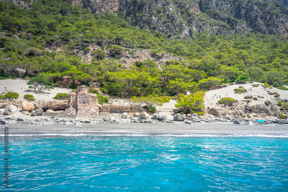 Agios Pavlos beach with Saint Paul church, a very old Byzantine church that was built at the place Selouda, an incredible beach at Opiso Egiali area.