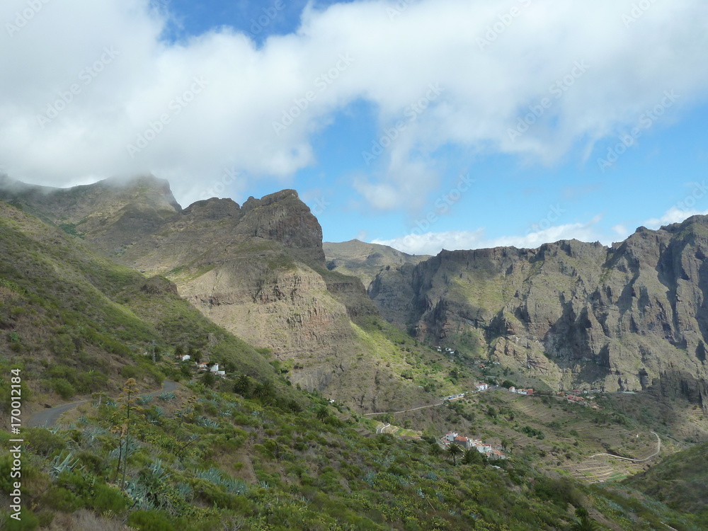 Fototapeta premium mountain landscape partially brightened by the sun
