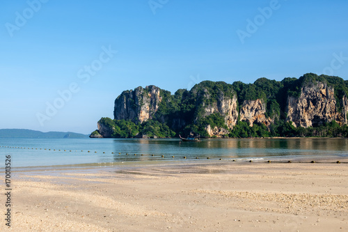 Railay west beach with mountain and long tail boat