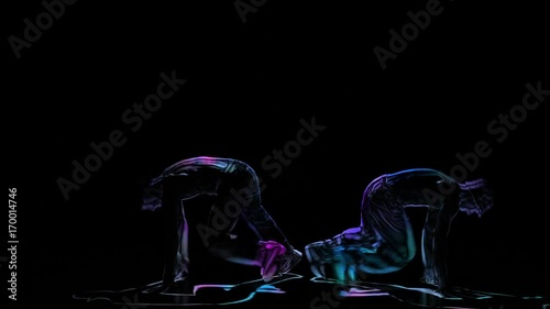 Computer graphics, silhouette two mans perform brakedance on black background photo