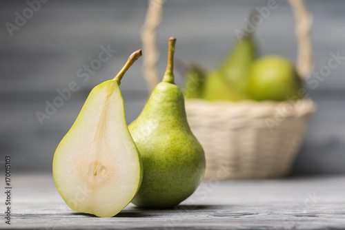 Close up of ripe pears over defocused background