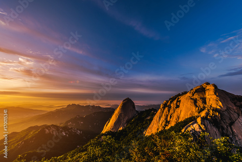 Boazan Mountains are covered with mist and morning sunrise in Bukhansan National Park in Seoul, South Korea.