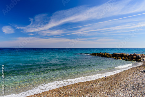 A beautiful pebbly beach in the village of Karlovasi, Samos island, Greece
