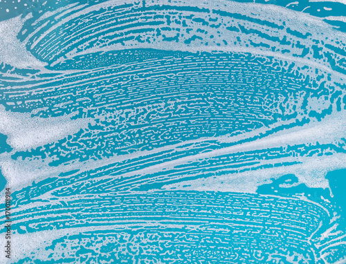 soap foam on a blue background
